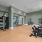 fitness center showing plenty of equipment and mo
