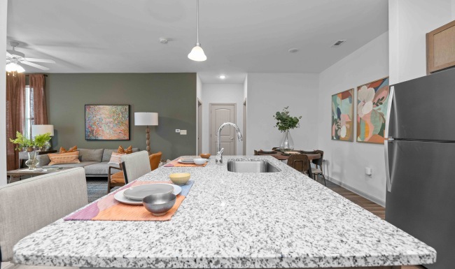 Stylish Interiors kitchen with an island and with modern appliances